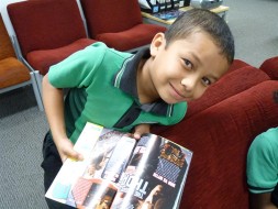 A student with a magazine